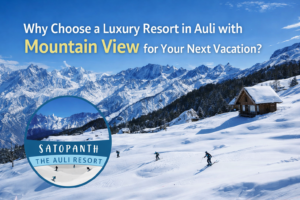 A Luxury Resort in Auli with Mountain View featuring snow-covered Himalayan peaks, skiing slopes, and Satopanth The Auli Resort surrounded by scenic alpine landscapes in Uttarakhand.